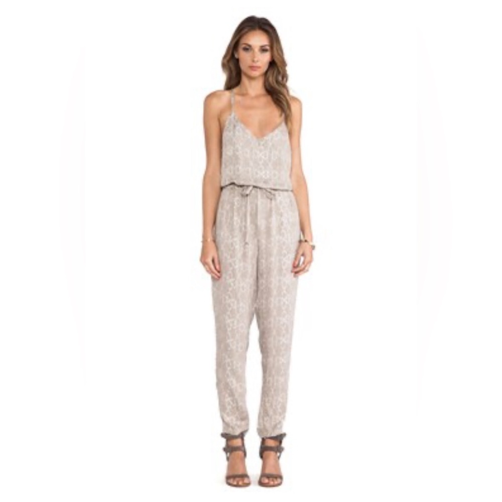 Free People “sunset” romper size M
